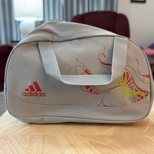 Adidas Gray Bag with Red and Yellow Design